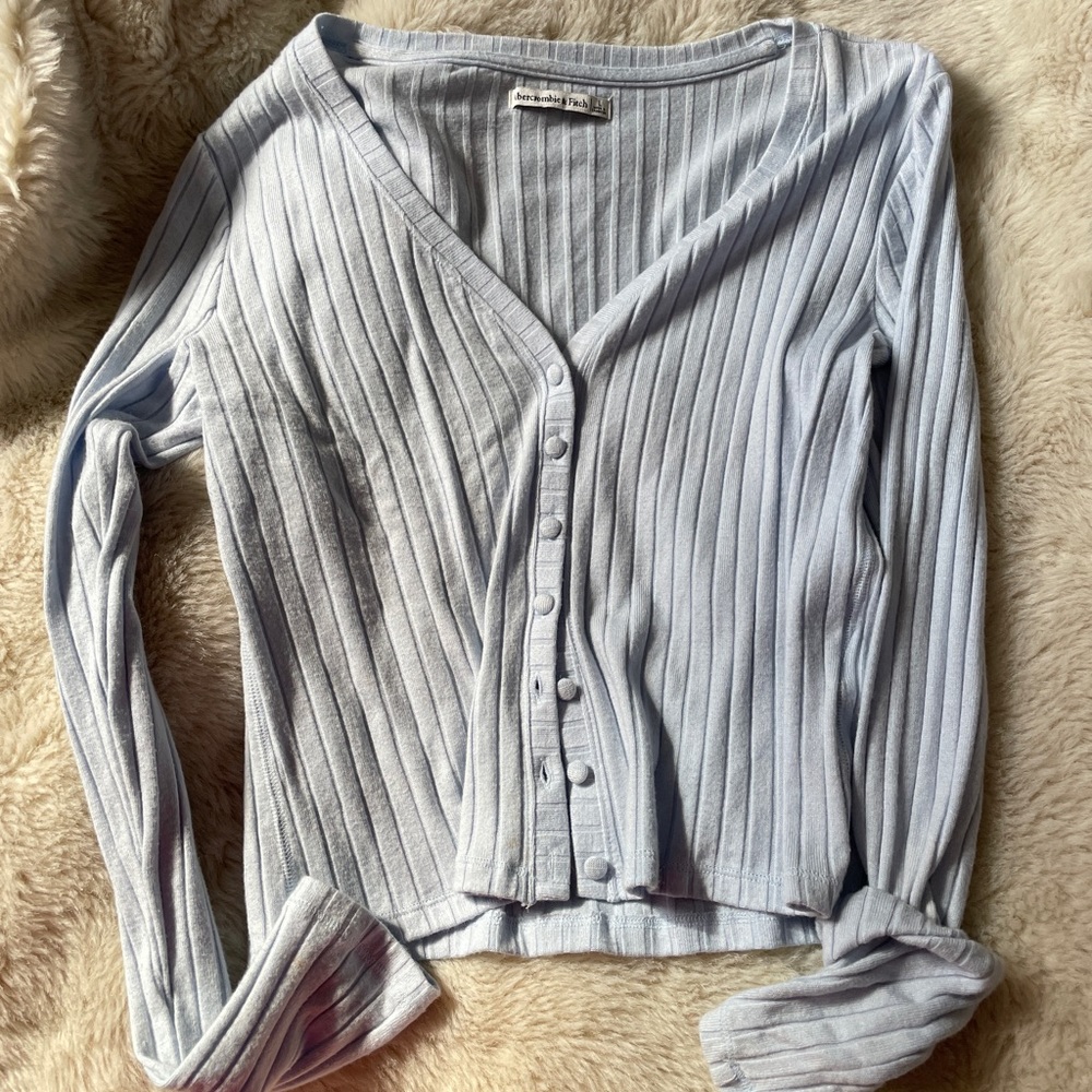 Light blue button up light sweater
